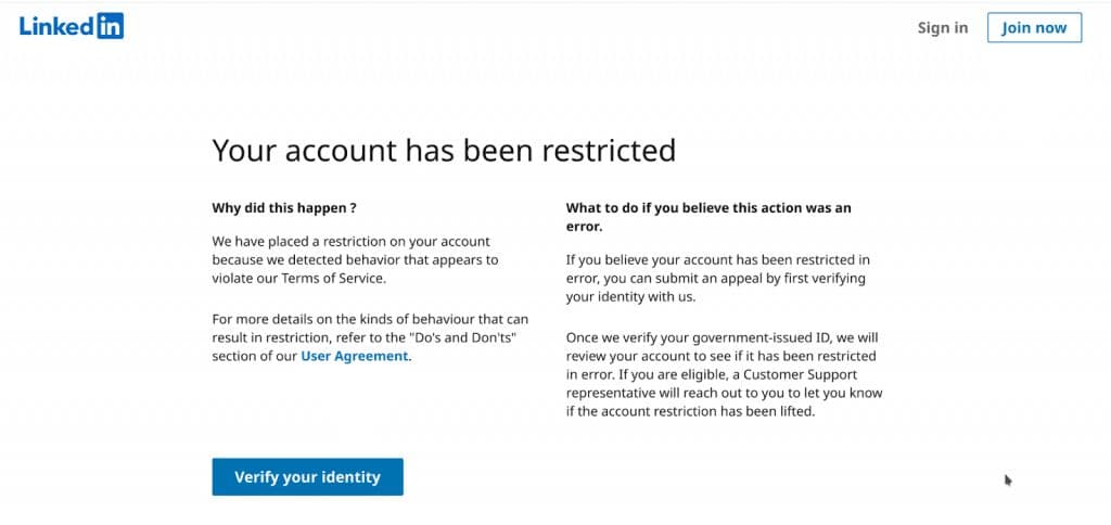 LinkedIn account restriction warning message displayed when artificial engagement is detected